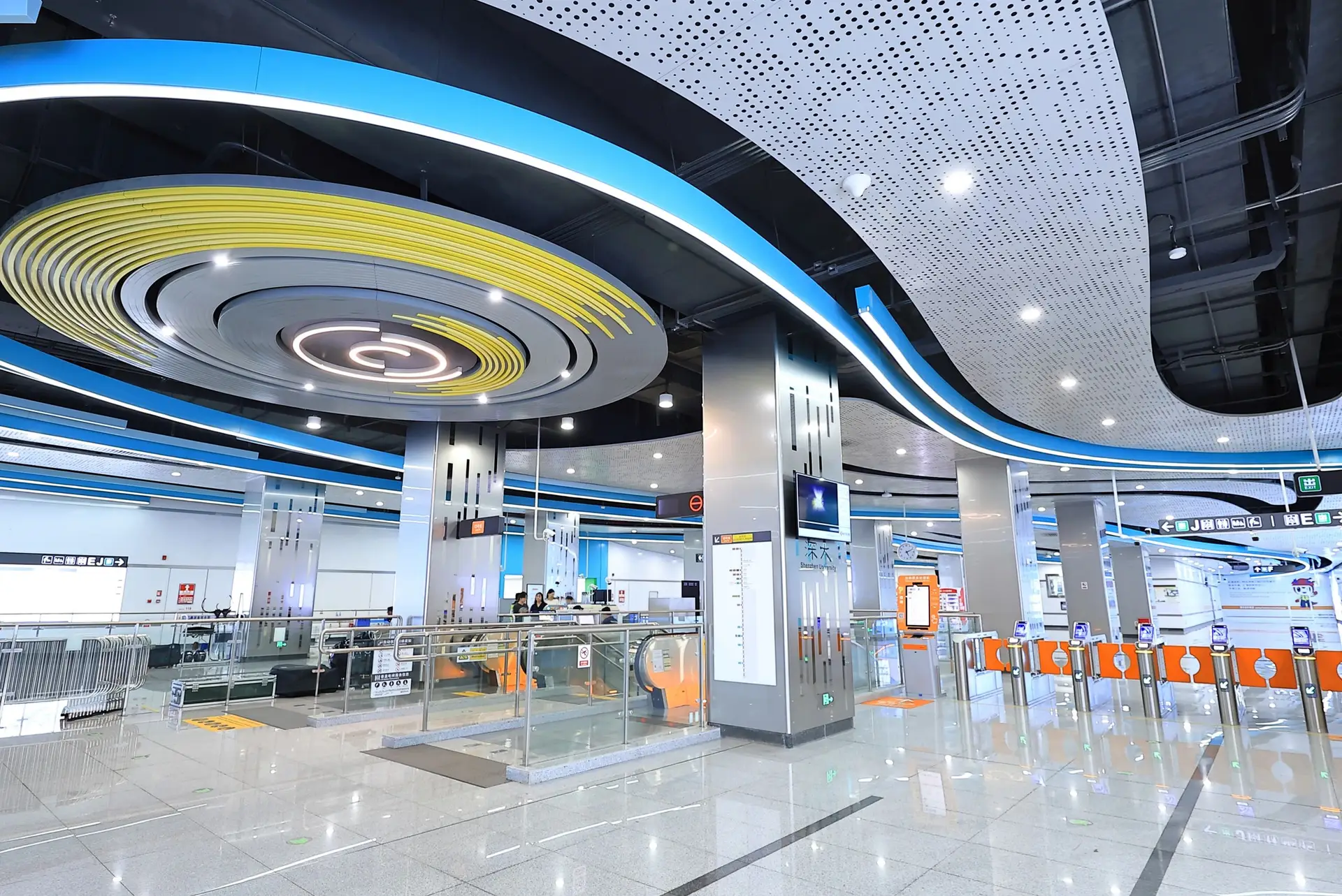 Large modern transit-style interior representing high-traffic facility spaces