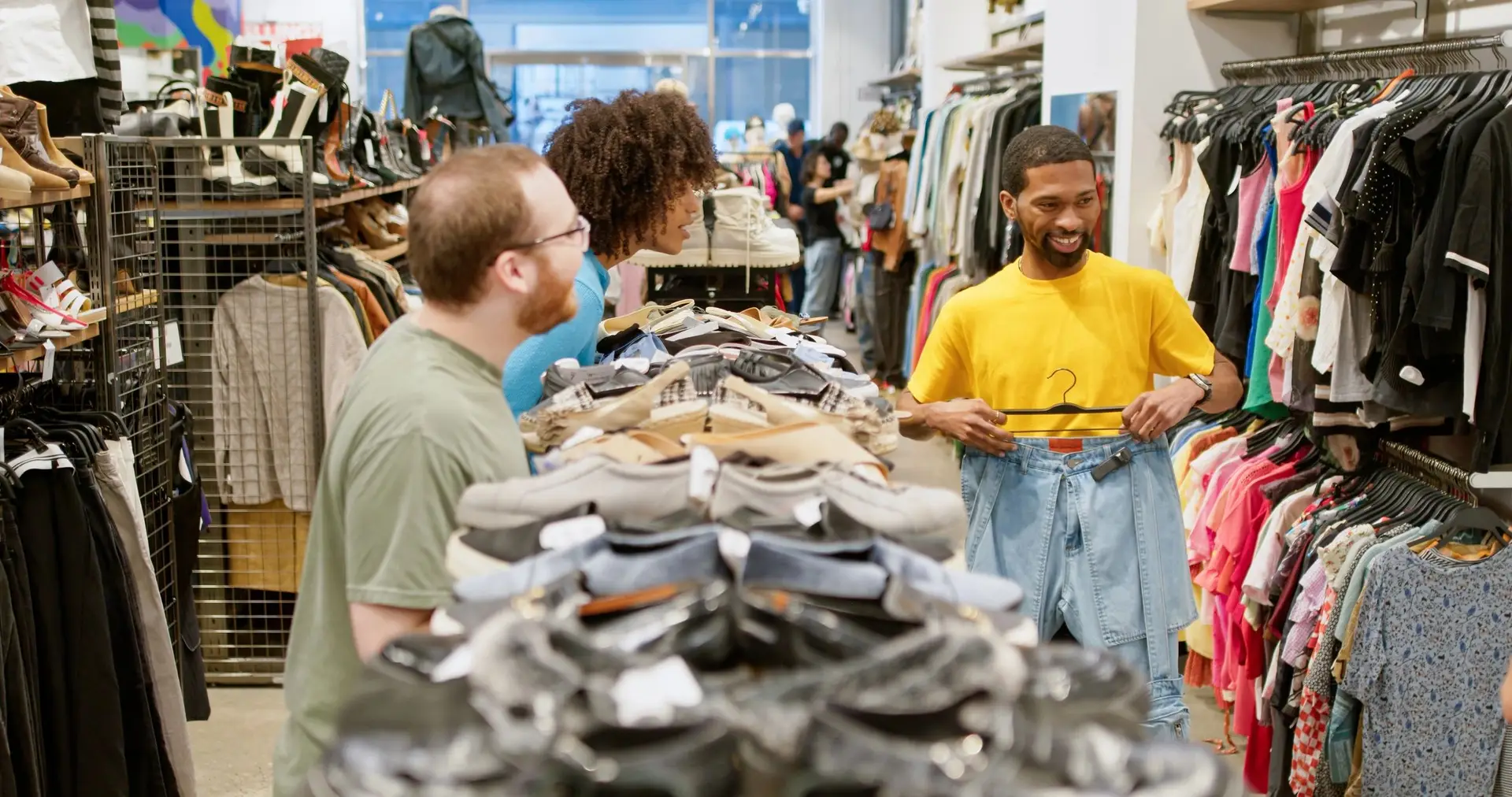 Retail customers moving through a modern store environment
